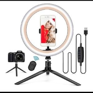 Brand new Ring light with tripod and 3 setting lighting fixture.